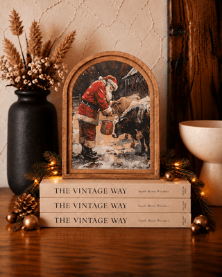 Santa with cows arch framed Christmas art print for festive farmhouse mantel styling
