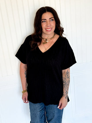Short Sleeve V Neck Extended Back Hem Textured Knit Top, Black and Natural - Top - The Farmhouse