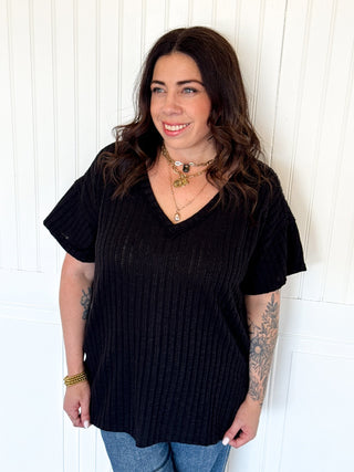 Short Sleeve V Neck Extended Back Hem Textured Knit Top, Black and Natural - Top - The Farmhouse