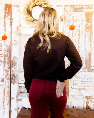 Styled view of Only Thing Spicy pumpkin spice pullover