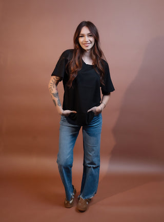 Back view of Stitch & Co black short sleeve knit top, Homestead style