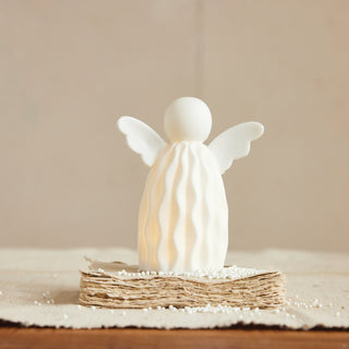 White stoneware bisque angel figurine with warm built-in LED light