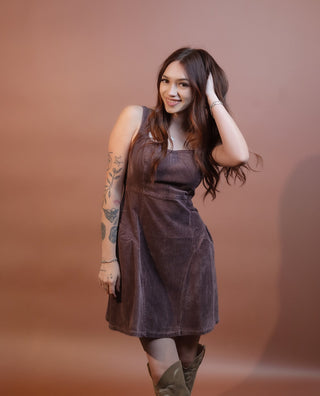 Side view of Sunday Edition washed corduroy drop-waist mini dress with square neckline