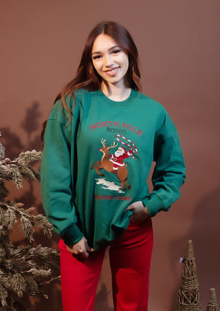 Close-up of ribbed crew neckline on North Pole Rodeo sweatshirt