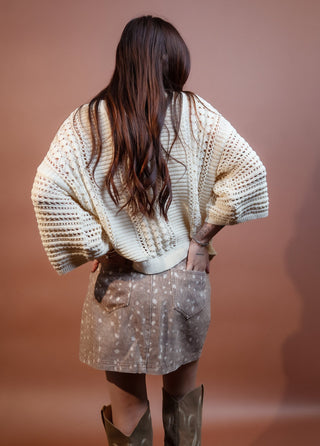 Detail view of Sunday Edition reindeer print A-line skirt