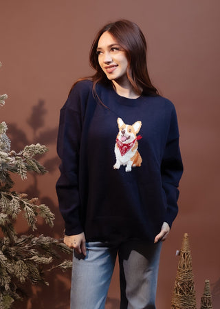 Deep navy fine-knit sweater with corgi graphic wearing a red paisley bandana