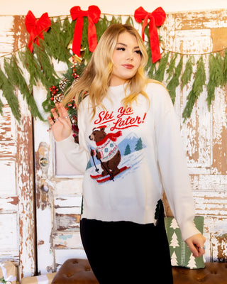 Soft knit mock neck sweater with Ski Ya Later skiing bear graphic