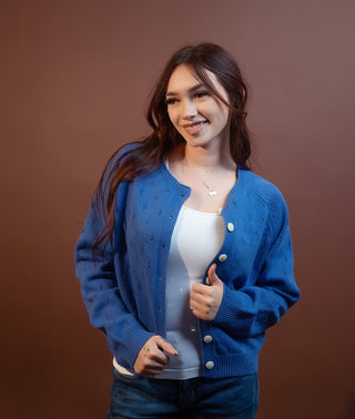 Drop-shoulder eyelet knit cardigan with oversized button details