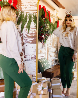 Styled view of Ivory Holiday Baking Club sweatshirt
