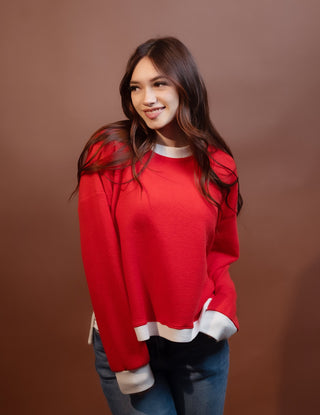 Detail view of round neckline on soft cloudy knit top
