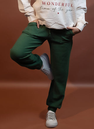 Detail view of cuffed hems on slim cloudy knit joggers
