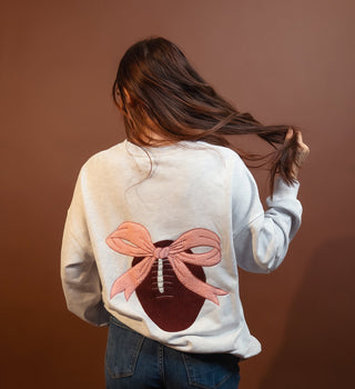 Gray pearl pullover with embroidered football and pink bow for game day