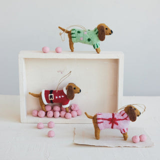 Wool felt dachshund Christmas ornament dressed in a colorful sweater